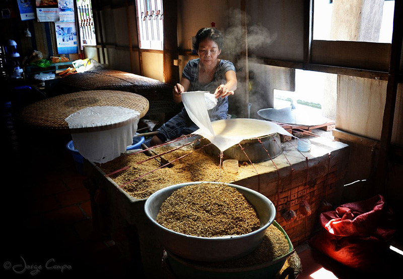 Local people making rice paper